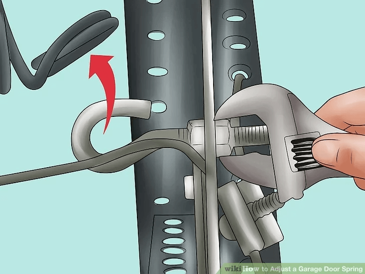 HOW TO ADJUST GARAGE DOOR REMOVE THE HOOK AND ADJUST THE TENSION