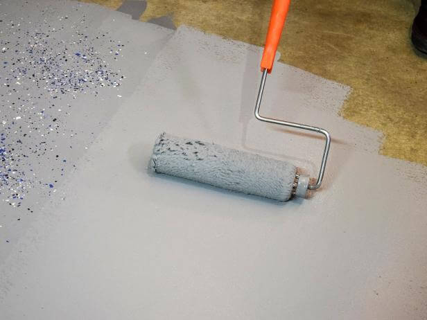 GARAGE FLOOR PAINTING. COAT WITH BONDING PRIMER