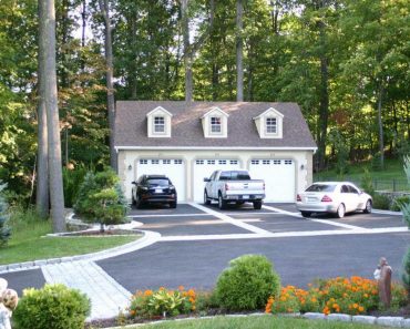 HOW BIG SHOULD THE DIMENSIONS OF A THREE-CAR GARAGE BE?
